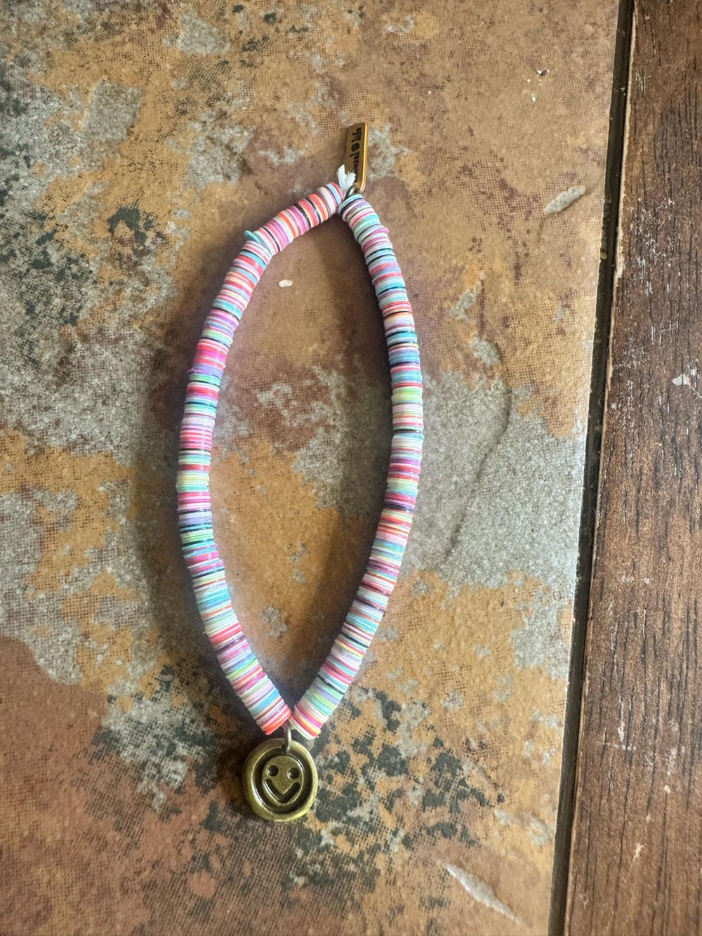Natural Life Colorful Pastel Disk Bead Bracelet with Smiley Charm